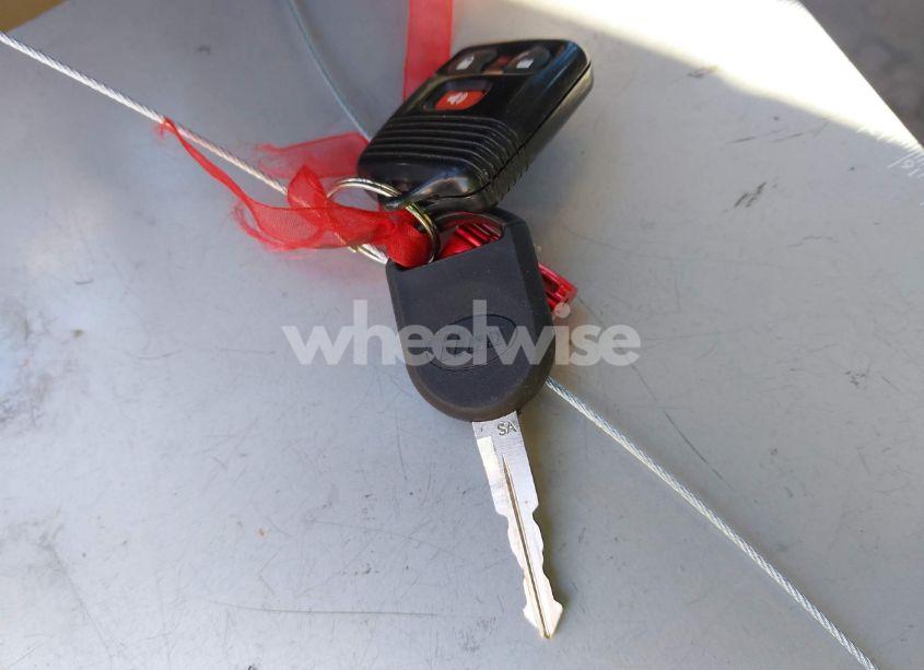 Photo 11 of 2005 Ford Escape XLS (VIN 1FMYU02ZX5KD52500)