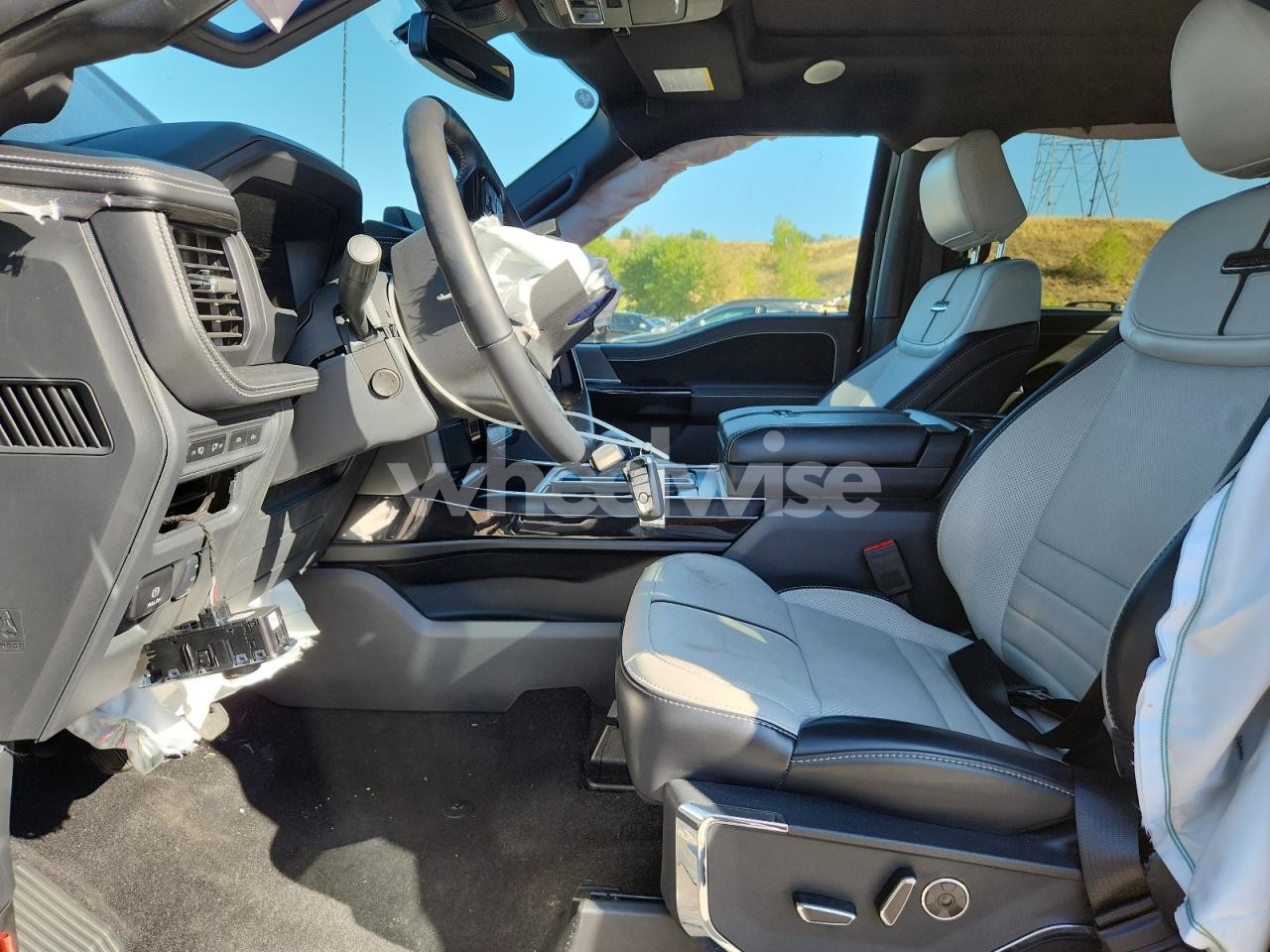 Photo 7 of 2024 FORD F150 LIGHTNING PLATINUM (VIN 1FT6W7L74RWG00105)