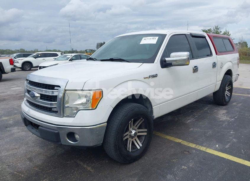 Photo 2 of 2013 Ford F-150 XLT (VIN 1FTFW1CF1DFA93418)