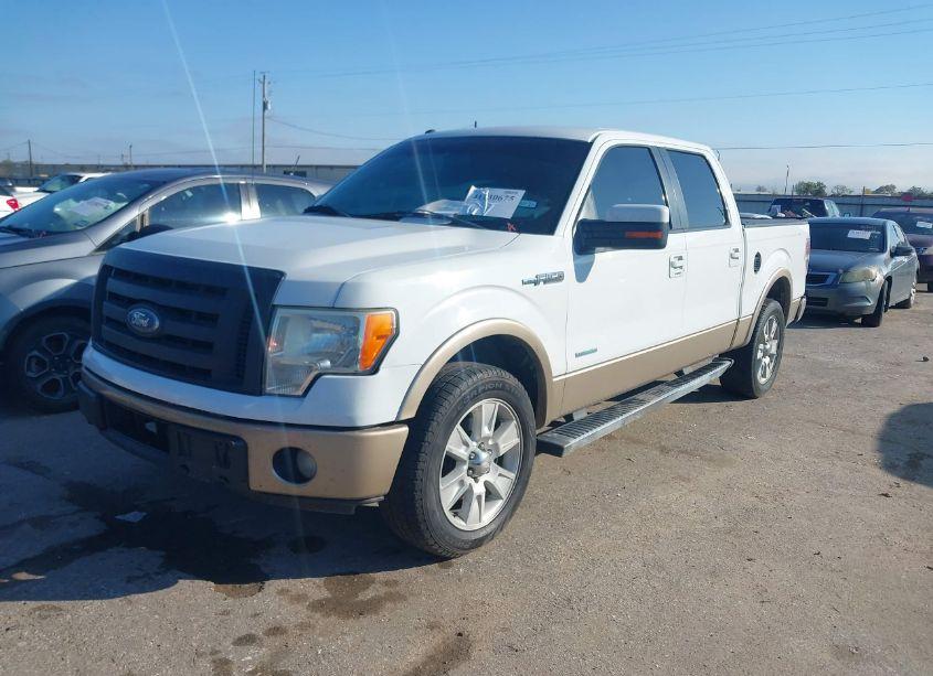 Photo 2 of 2012 Ford F-150 LARIAT (VIN 1FTFW1CTXCKD95608)
