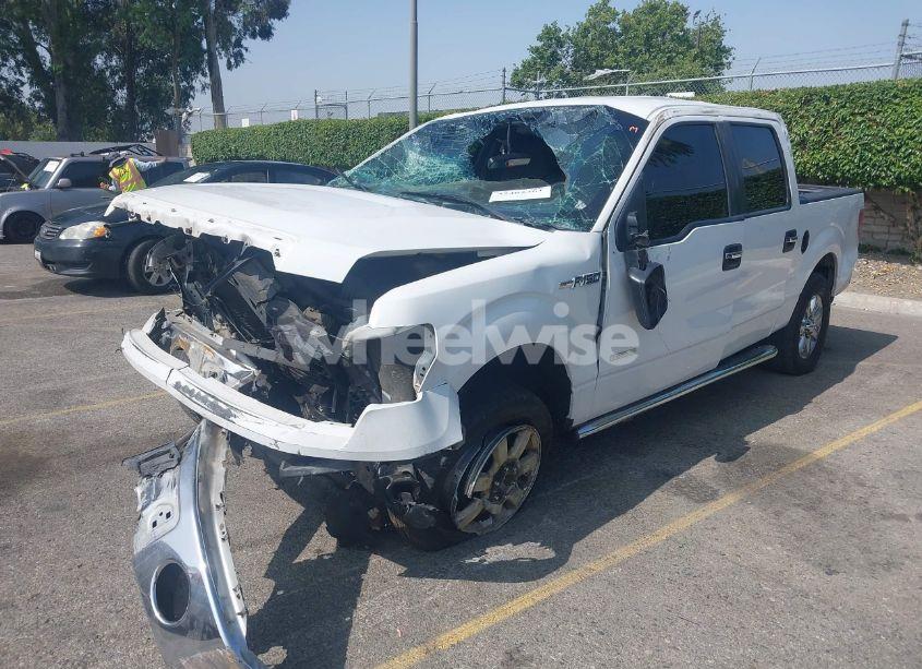 Photo 2 of 2014 Ford F-150 XLT (VIN 1FTFW1CTXEFC00103)