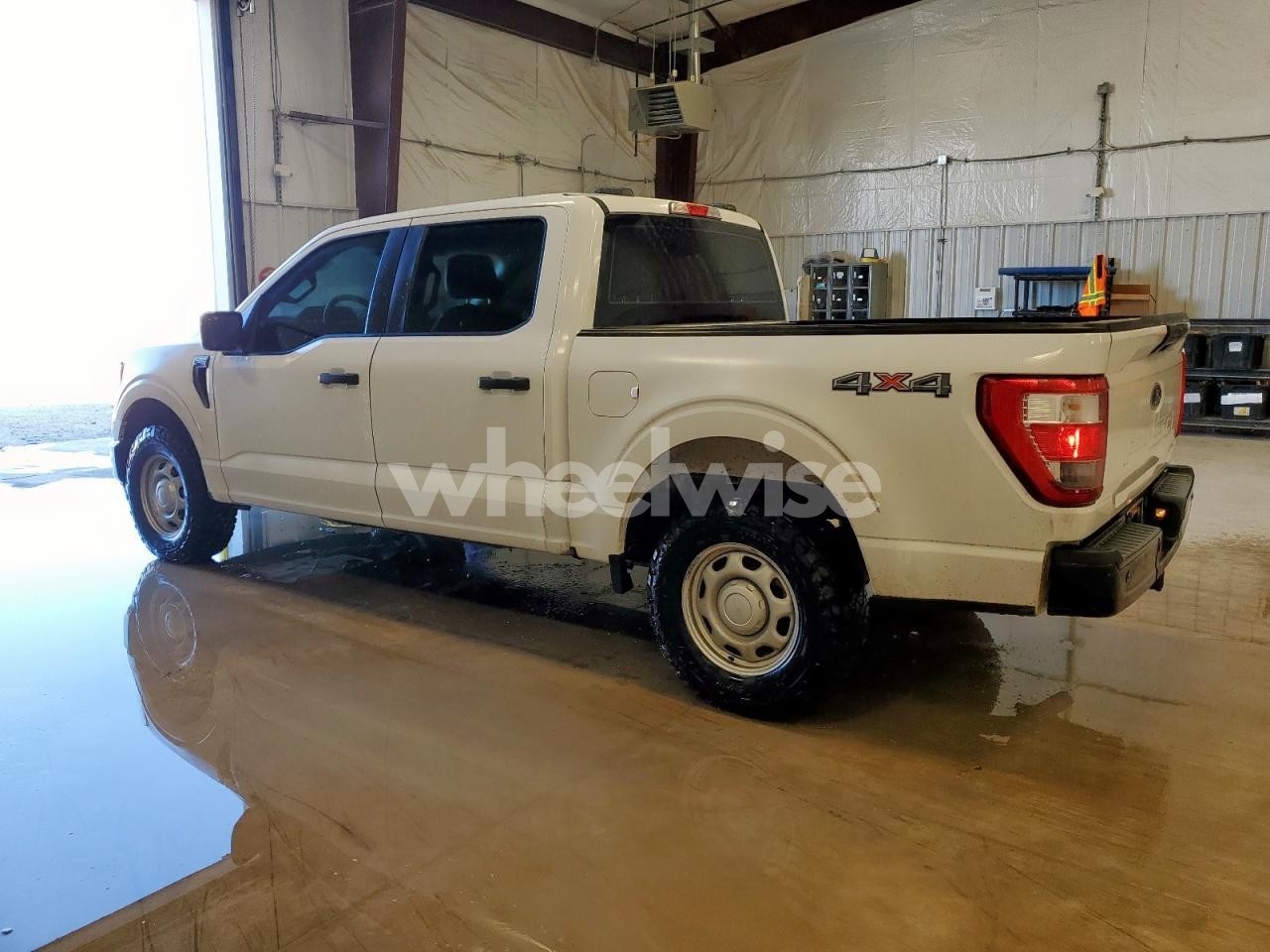 Photo 2 of 2021 FORD F150 SUPERCREW (VIN 1FTFW1E55MKF13841)