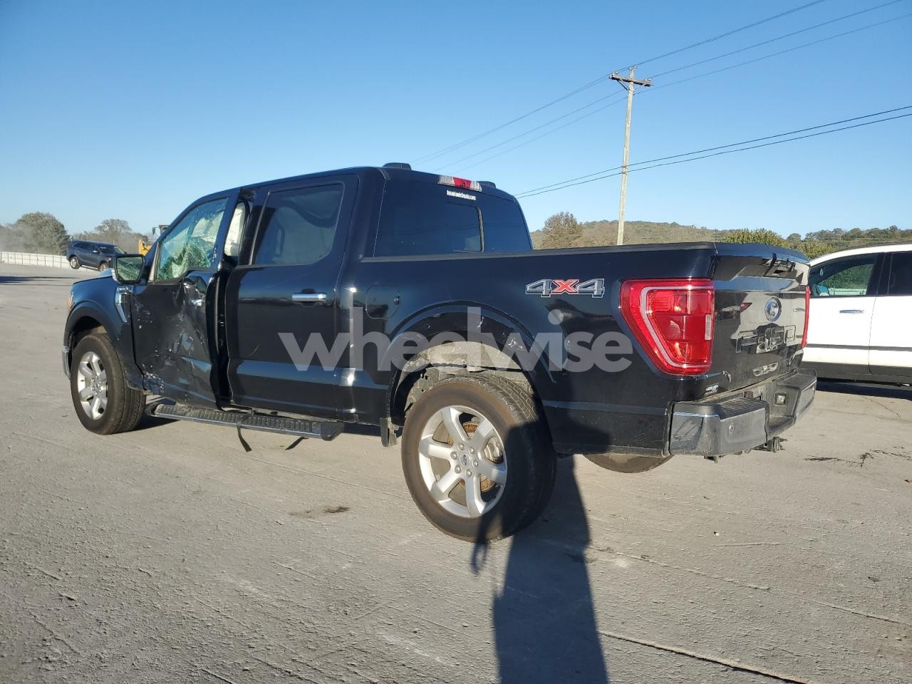 Photo 2 of 2021 FORD F150 SUPERCREW (VIN 1FTFW1E59MFA43855)