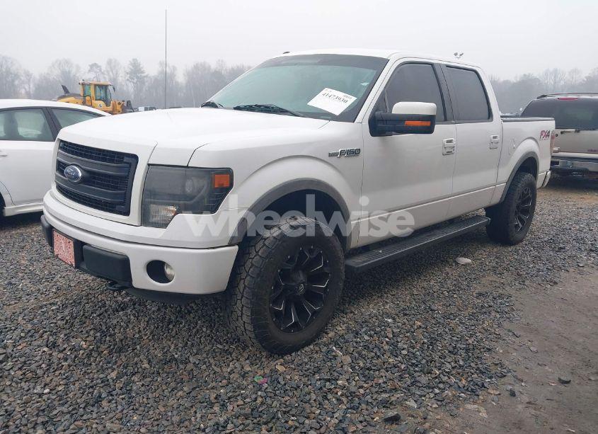 Photo 2 of 2014 Ford F-150 FX4 (VIN 1FTFW1EF3EFA23210)