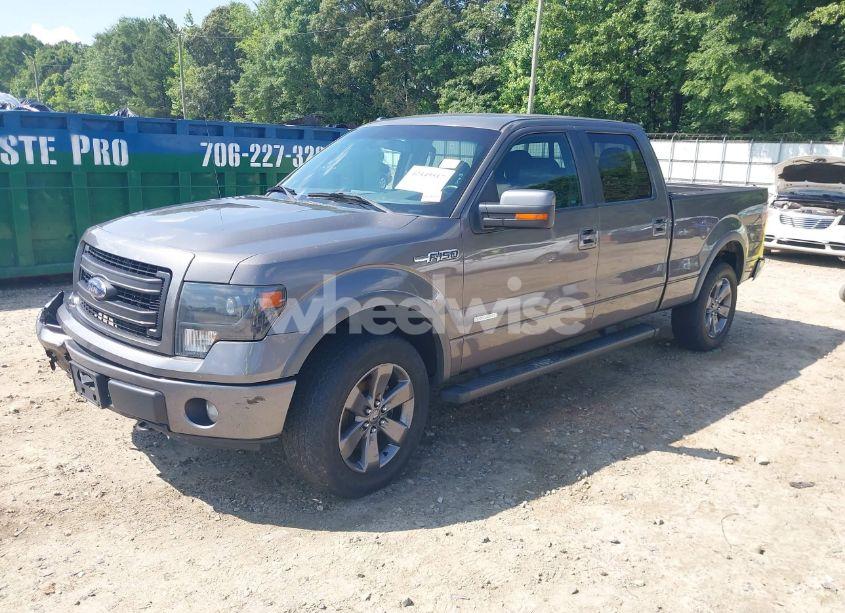 Photo 2 of 2013 Ford F-150 FX4 (VIN 1FTFW1ET5DKE05542)