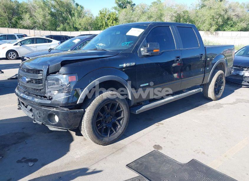 Photo 2 of 2014 Ford F-150 FX4 (VIN 1FTFW1ET5EFC21910)