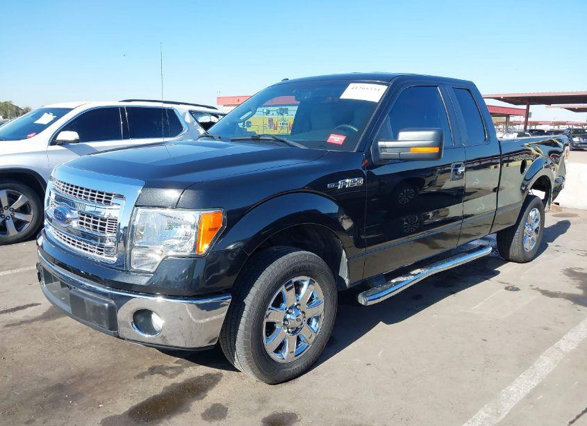 Photo 2 of 2014 Ford F-150 XLT (VIN 1FTFX1CFXEFB87599)
