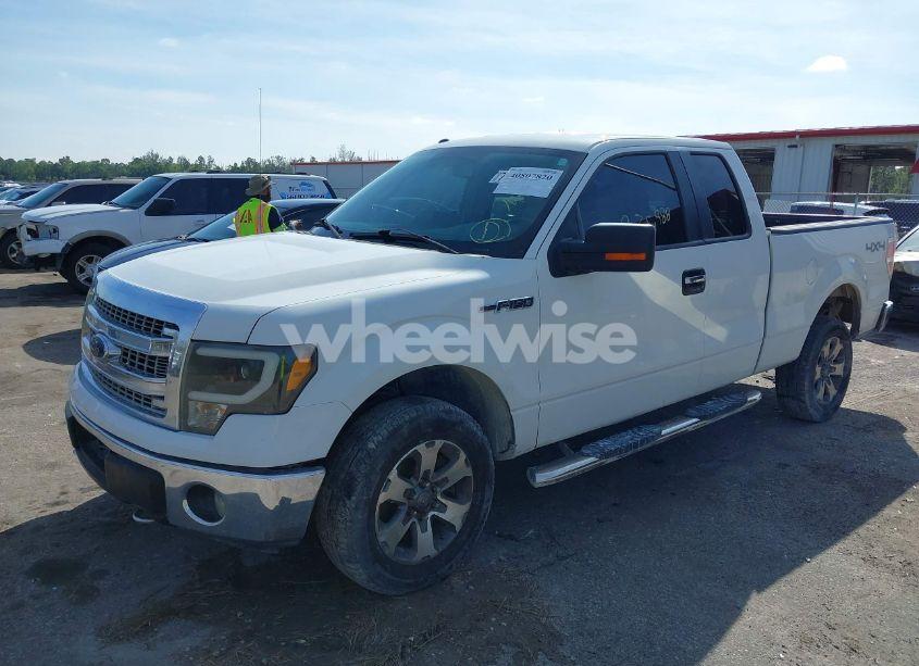 Photo 2 of 2014 Ford F-150 XLT (VIN 1FTFX1EF0EFA70823)