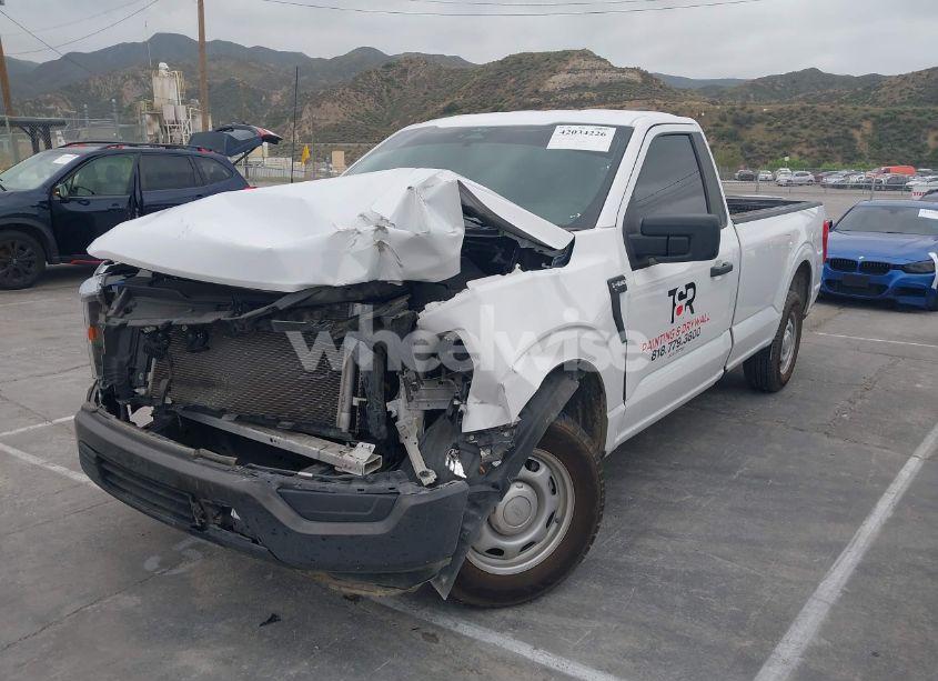 Photo 2 of 2022 Ford F-150 XL (VIN 1FTMF1CB4NKE51463)