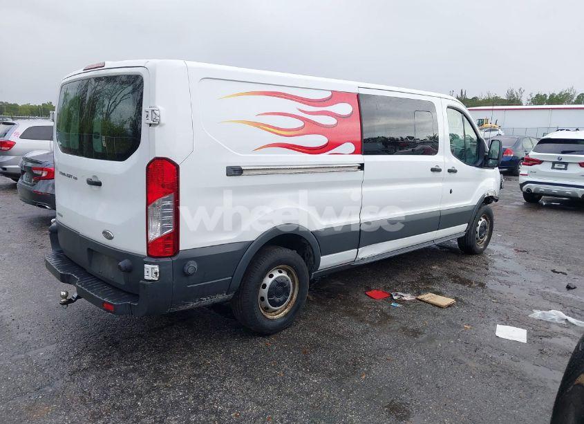 Photo 4 of 2015 Ford Transit-150 (VIN 1FTNE2YGXFKA32424)