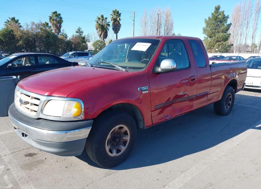 Photo 2 of 2000 Ford F-150 LARIAT/WORK SERIES/XL/XLT (VIN 1FTPX17L9YKA64098)