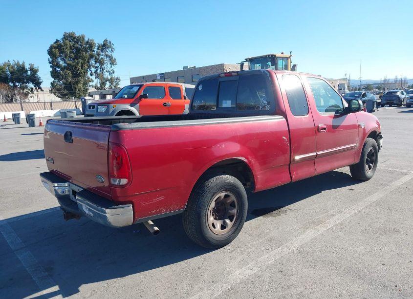Photo 4 of 2000 Ford F-150 LARIAT/WORK SERIES/XL/XLT (VIN 1FTPX17L9YKA64098)
