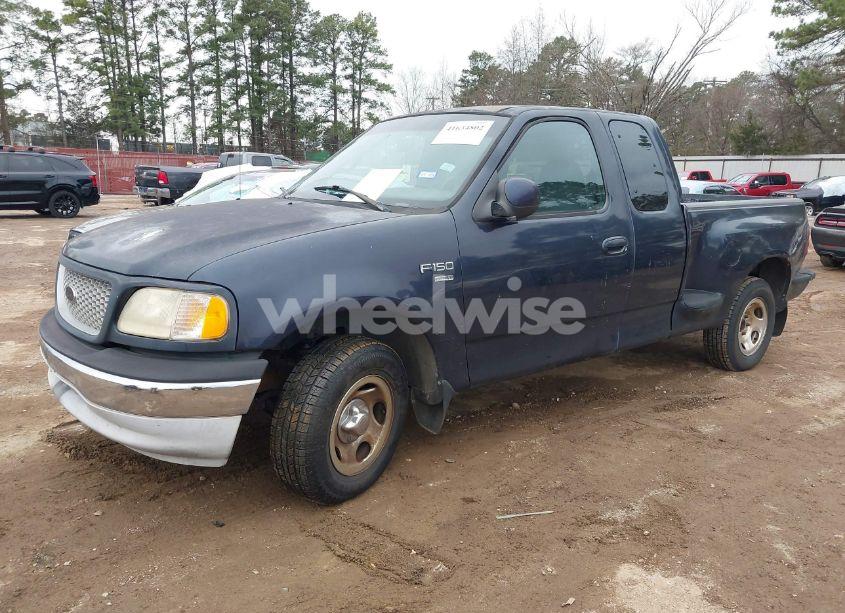 Photo 2 of 1999 Ford F-150 LARIAT/WORK SERIES/XL/XLT (VIN 1FTRX07W3XKC24438)