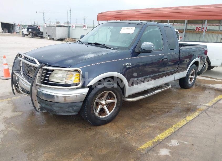 Photo 2 of 2000 Ford F-150 LARIAT/WORK SERIES/XL/XLT (VIN 1FTRX17L0YKA68579)