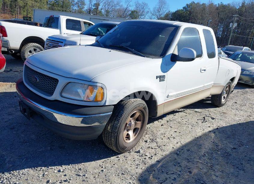 Photo 2 of 2000 Ford F-150 LARIAT/WORK SERIES/XL/XLT (VIN 1FTRX17L2YNB10894)