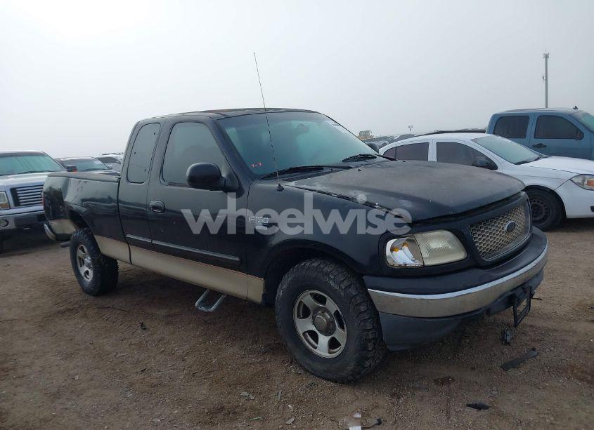 Photo 13 of 2000 Ford F-150 LARIAT/WORK SERIES/XL/XLT (VIN 1FTRX17L4YKB03771)