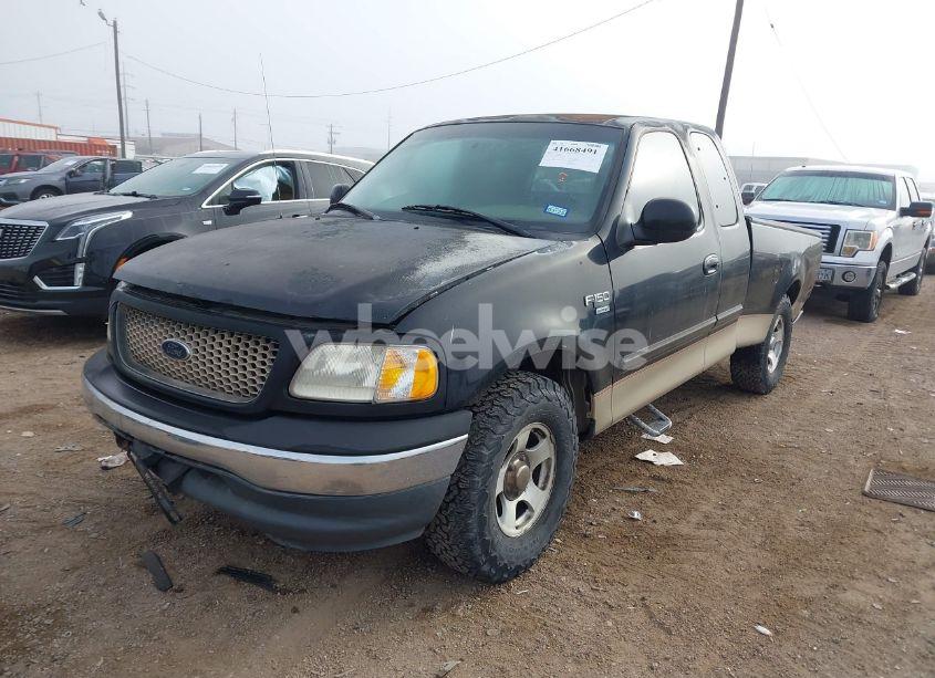 Photo 2 of 2000 Ford F-150 LARIAT/WORK SERIES/XL/XLT (VIN 1FTRX17L4YKB03771)