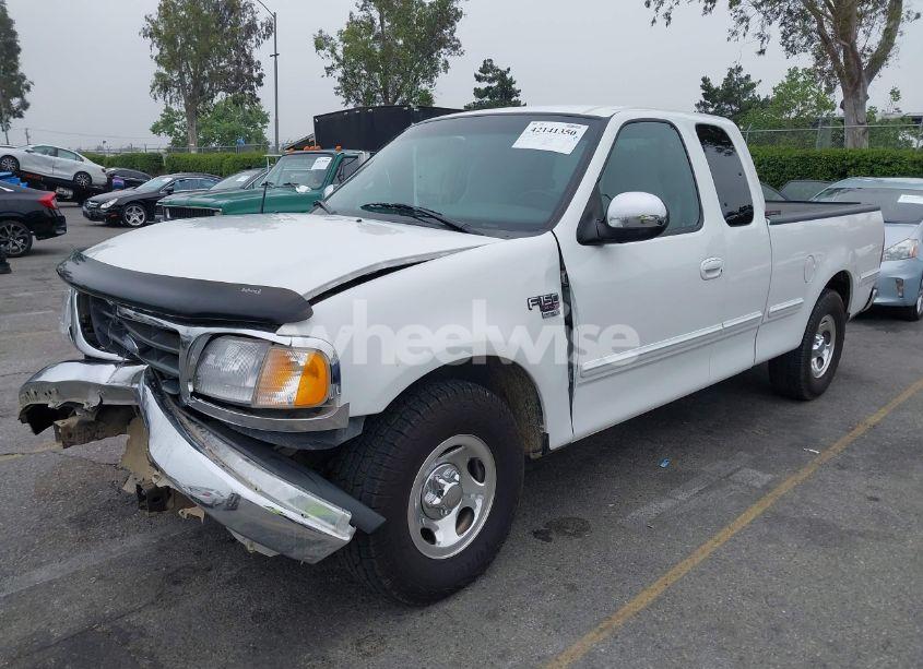 Photo 2 of 2000 Ford F-150 LARIAT/WORK SERIES/XL/XLT (VIN 1FTRX17L4YNA39407)