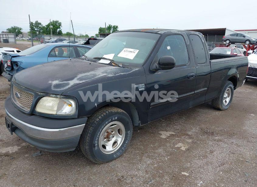 Photo 2 of 2000 Ford F-150 LARIAT/WORK SERIES/XL/XLT (VIN 1FTRX17L6YKA30614)