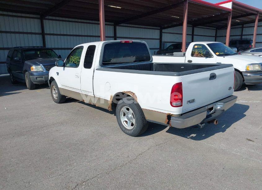 Photo 3 of 2000 Ford F-150 LARIAT/WORK SERIES/XL/XLT (VIN 1FTRX17W0YNB25467)