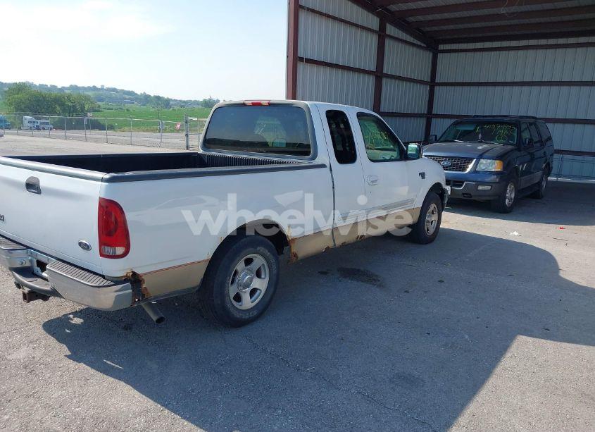 Photo 4 of 2000 Ford F-150 LARIAT/WORK SERIES/XL/XLT (VIN 1FTRX17W0YNB25467)