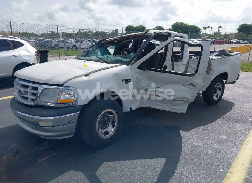 Photo 2 of 1999 Ford F-150 LARIAT/WORK SERIES/XL/XLT (VIN 1FTRX17W6XNB65695)