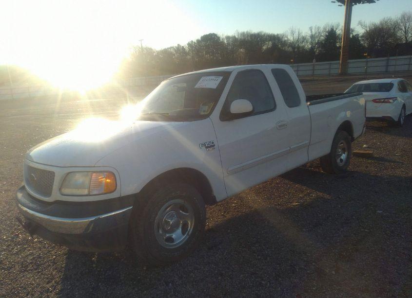 Photo 2 of 1999 Ford F-150 LARIAT/WORK SERIES/XL/XLT (VIN 1FTRX17W7XKB77467)