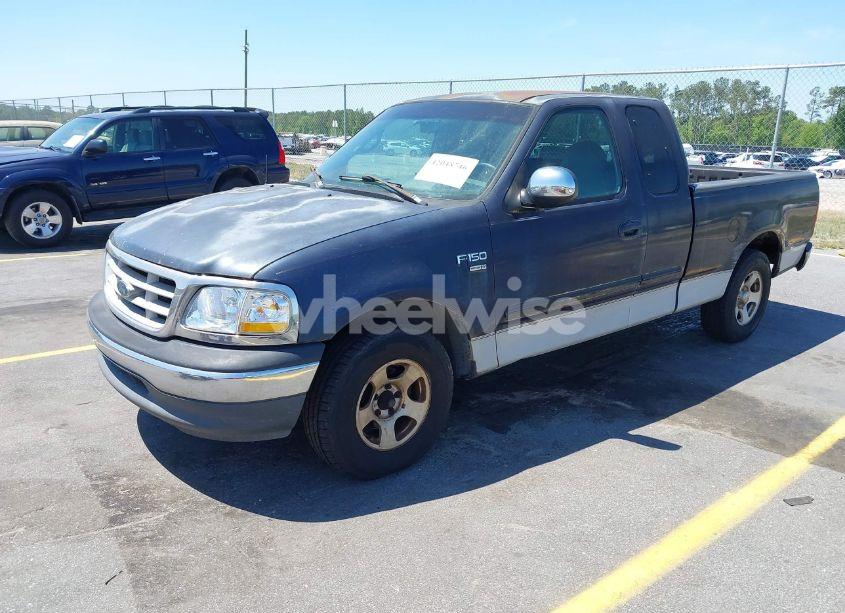 Photo 2 of 1999 Ford F-150 LARIAT/WORK SERIES/XL/XLT (VIN 1FTRX17W9XNB32397)