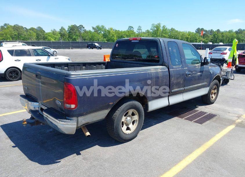 Photo 4 of 1999 Ford F-150 LARIAT/WORK SERIES/XL/XLT (VIN 1FTRX17W9XNB32397)