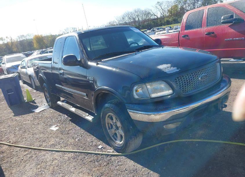 1999 Ford F-150 LARIAT/XL/XLT (VIN 1FTRX18L0XNC01403) main photo
