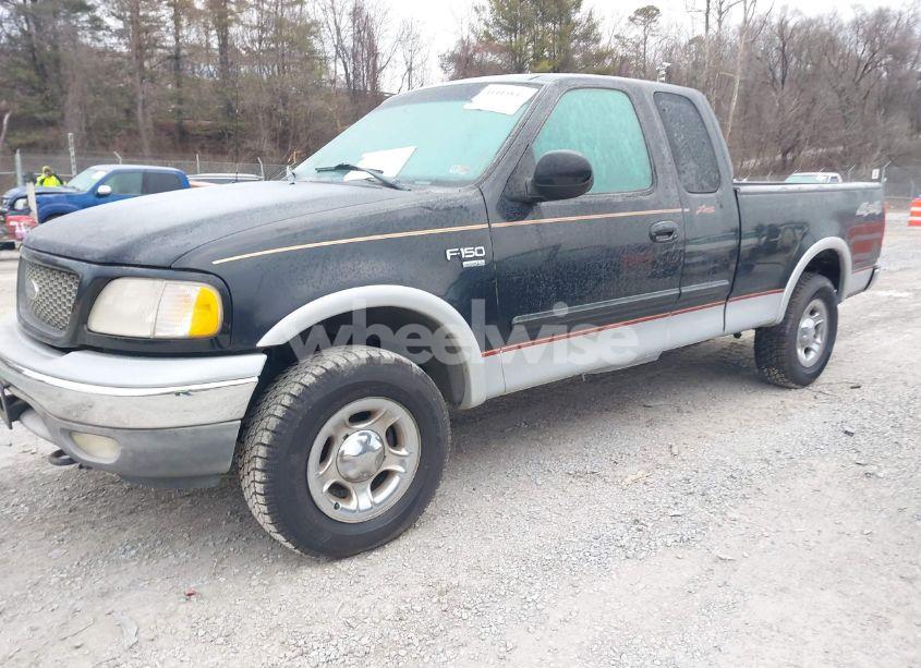 Photo 2 of 2000 Ford F-150 LARIAT/WORK SERIES/XL/XLT (VIN 1FTRX18L0YNC05663)