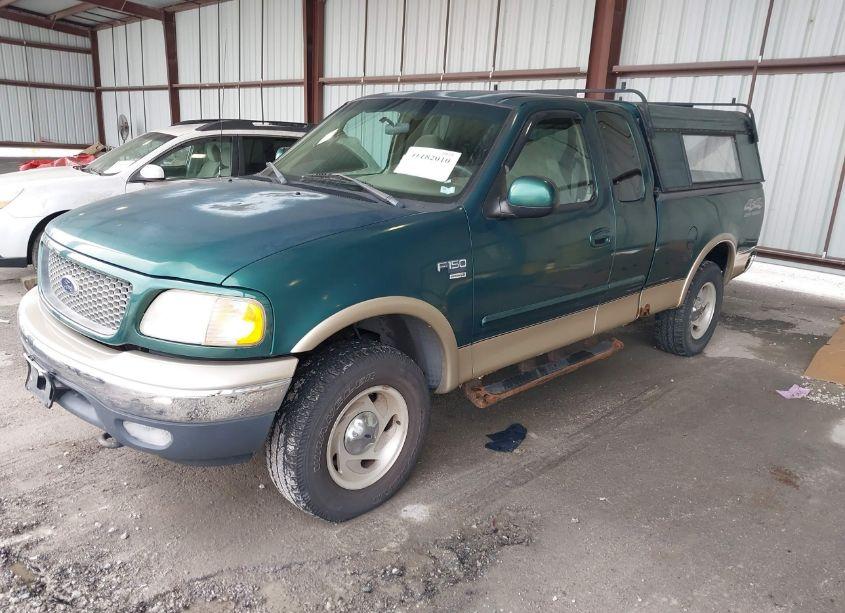 Photo 2 of 2000 Ford F-150 LARIAT/WORK SERIES/XL/XLT (VIN 1FTRX18L4YNC28346)