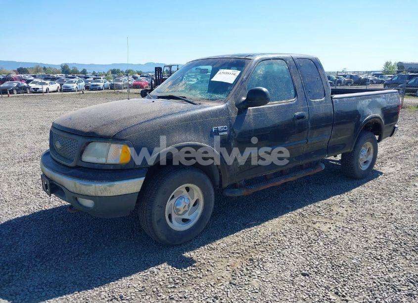 Photo 2 of 2000 Ford F-150 LARIAT/WORK SERIES/XL/XLT (VIN 1FTRX18L6YKB06492)