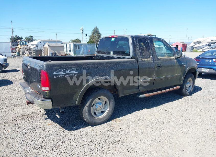 Photo 4 of 2000 Ford F-150 LARIAT/WORK SERIES/XL/XLT (VIN 1FTRX18L6YKB06492)