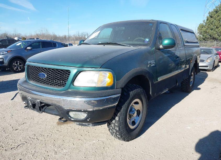 Photo 2 of 2000 Ford F-150 LARIAT/WORK SERIES/XL/XLT (VIN 1FTRX18L8YNA42714)