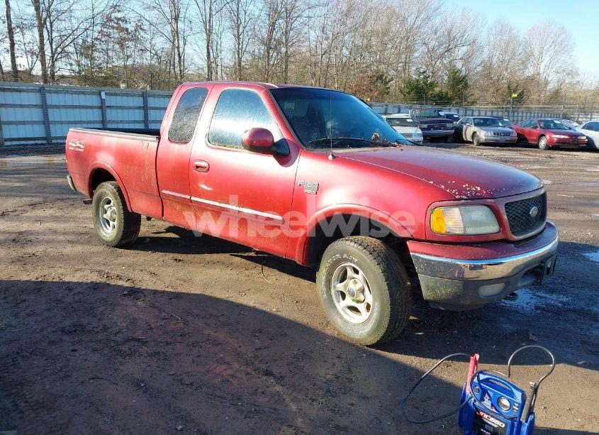 2000 Ford F-150 LARIAT/WORK SERIES/XL/XLT (VIN 1FTRX18W0YNA73725) main photo