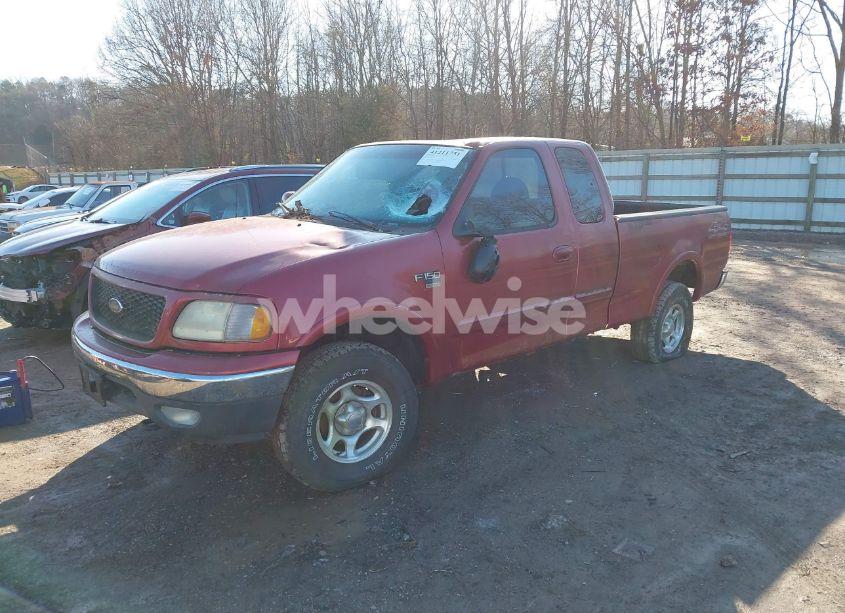 Photo 2 of 2000 Ford F-150 LARIAT/WORK SERIES/XL/XLT (VIN 1FTRX18W0YNA73725)
