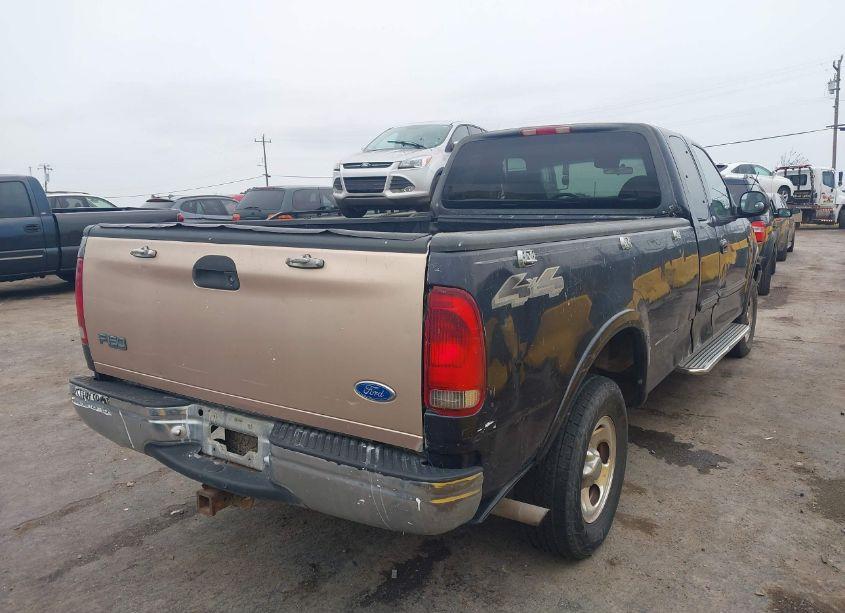 Photo 4 of 2000 Ford F-150 LARIAT/WORK SERIES/XL/XLT (VIN 1FTRX18W3YKB11143)