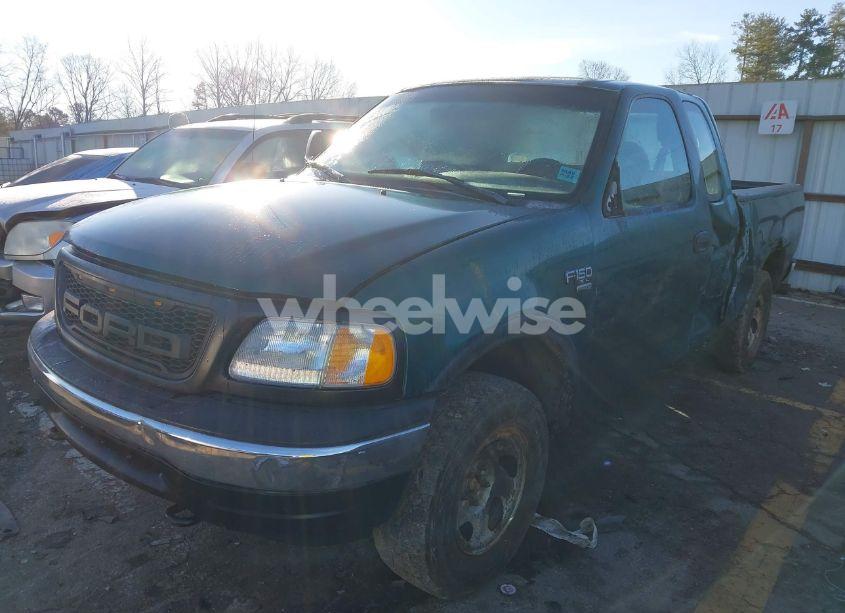 Photo 2 of 1999 Ford F-150 LARIAT/WORK SERIES/XL/XLT (VIN 1FTRX18W7XNA40655)