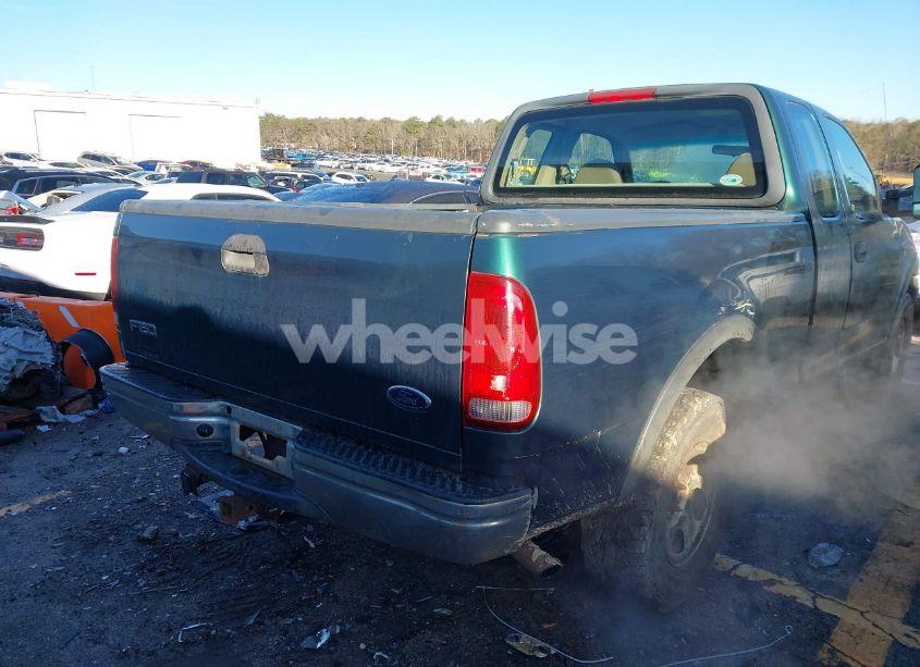 Photo 4 of 1999 Ford F-150 LARIAT/WORK SERIES/XL/XLT (VIN 1FTRX18W7XNA40655)