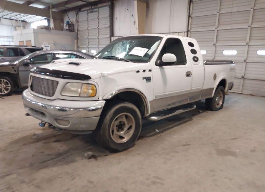 Photo 2 of 2000 Ford F-150 LARIAT/WORK SERIES/XL/XLT (VIN 1FTRX18W7YNA62690)