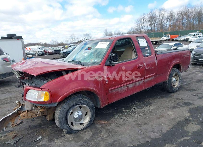 Photo 2 of 2000 Ford F-150 LARIAT/WORK SERIES/XL/XLT (VIN 1FTRX18W8YNB08110)
