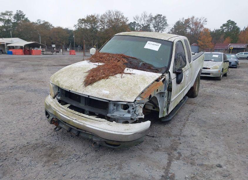 Photo 2 of 1999 Ford F-150 LARIAT/WORK SERIES/XL/XLT (VIN 1FTRX18W9XNA51186)