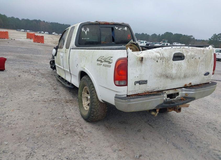 Photo 3 of 1999 Ford F-150 LARIAT/WORK SERIES/XL/XLT (VIN 1FTRX18W9XNA51186)