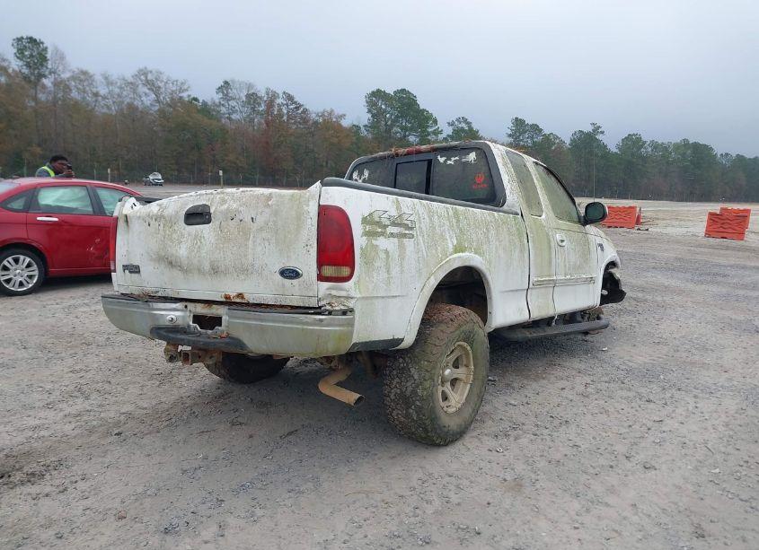 Photo 4 of 1999 Ford F-150 LARIAT/WORK SERIES/XL/XLT (VIN 1FTRX18W9XNA51186)