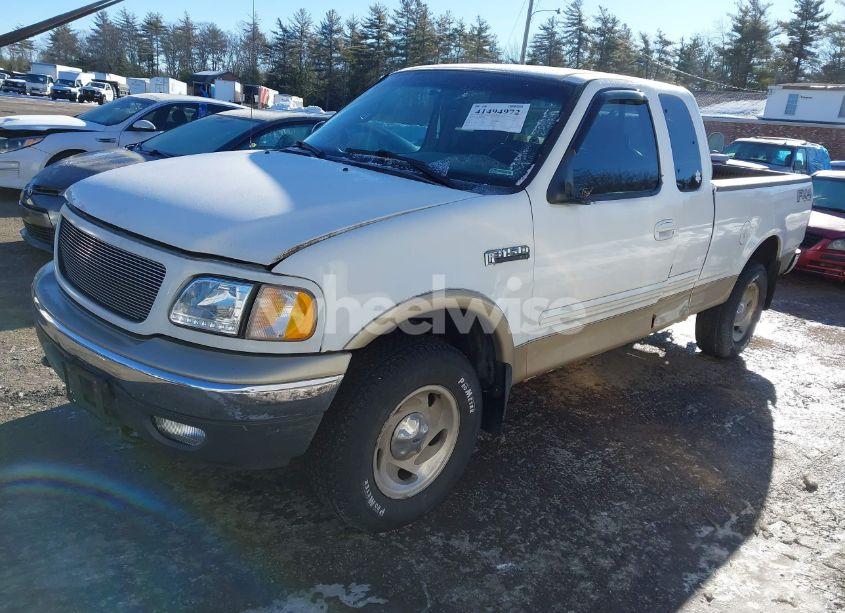 Photo 2 of 2000 Ford F-150 LARIAT/WORK SERIES/XL/XLT (VIN 1FTRX18W9YNB14241)