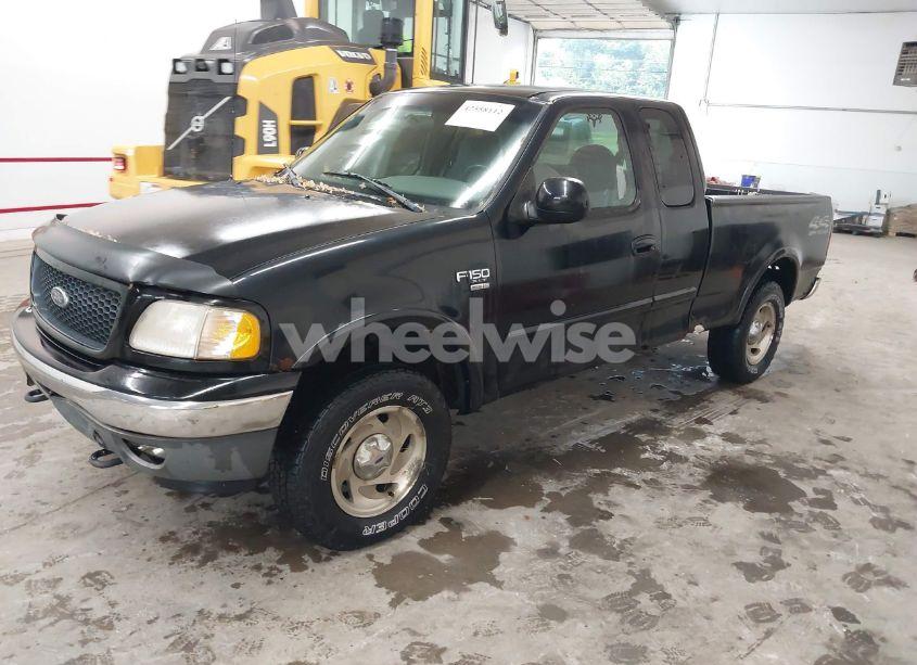 Photo 2 of 2000 Ford F-150 LARIAT/WORK SERIES/XL/XLT (VIN 1FTRX18W9YNB67215)