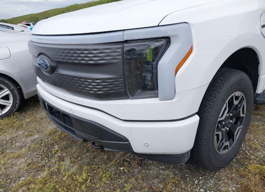 Photo 12 of 2023 Ford F-150 LIGHTNING XLT (VIN 1FTVW1EL5PWG28995)