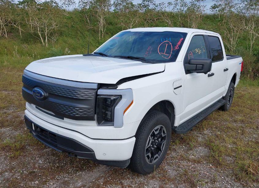 Photo 2 of 2023 Ford F-150 LIGHTNING XLT (VIN 1FTVW1EL5PWG28995)