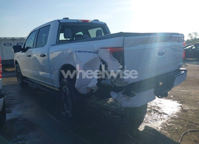 Photo 3 of 2023 Ford F-150 LIGHTNING XLT (VIN 1FTVW1EL6PWG34059)